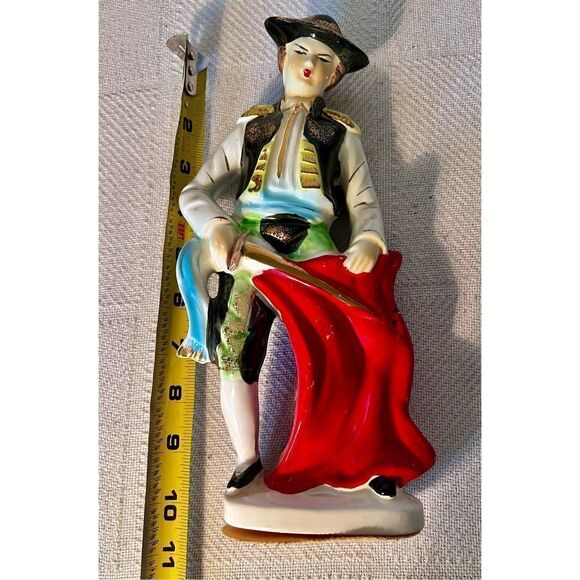 Vibrant Mid Century Bullfighter Figurine
Matador Statue With Sword & Red
Cape - Picture 10 of 12